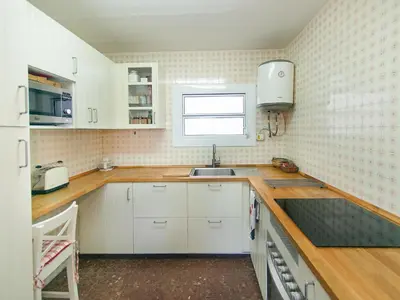 Una cocina o zona de cocina en Ático de Lujo en Palamós, Vista al Mar, Parking Incluido - ES-360-3