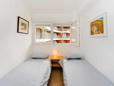 Cama o camas de una habitación en Apartamento Frente al Mar en Palamós, Aire Acondicionado, WiFi - ES-360-4