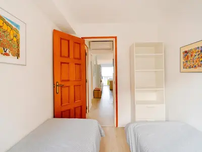 Cama o camas de una habitación en Apartamento Frente al Mar en Palamós, Aire Acondicionado, WiFi - ES-360-4