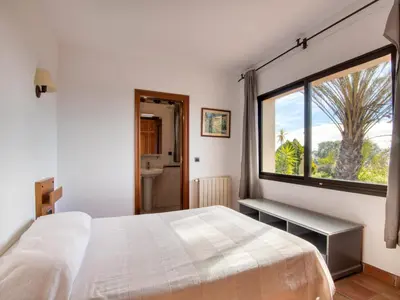 Cama o camas de una habitación en Casa de Lujo con Piscina Privada en Platja d'Aro - ES-360-6