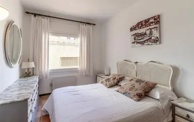 Cama o camas de una habitación en Apartamento La Vela con Vistas al Mar - WeHost Costa Brava