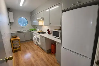 Una cocina o zona de cocina en Club de Mar