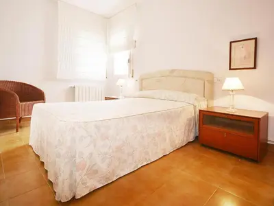 Cama o camas de una habitación en Apartamento Terraza y Jardín en Platja d'Aro - ES-360-9