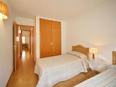 Cama o camas de una habitación en Apartamento Terraza y Jardín en Platja d'Aro - ES-360-9