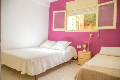 Cama o camas de una habitación en Canyelles Beach Apartment