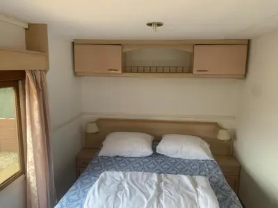 Cama o camas de una habitación en Rancho Catalan 1