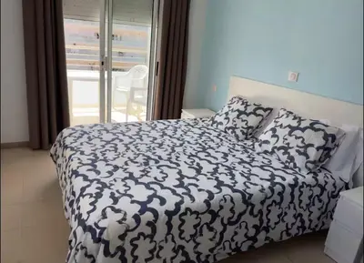 Cama o camas de una habitación en Apartamentos Brisa Marina