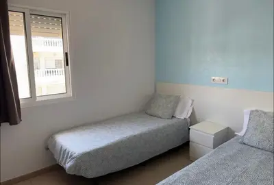 Cama o camas de una habitación en Apartamentos Brisa Marina