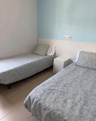 Cama o camas de una habitación en Apartamentos Brisa Marina