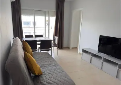 Una televisión o centro de entretenimiento en Apartamentos Brisa Marina