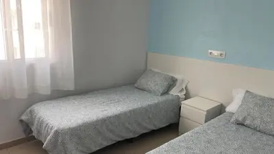 Cama o camas de una habitación en Apartamentos Brisa Marina