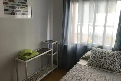 Cama o camas de una habitación en Seahomes Vacations - Amazing Seafront Apt & PKG