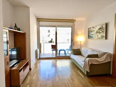 Una televisión o centro de entretenimiento en EVH135 Apartamento con piscina comunitaria
