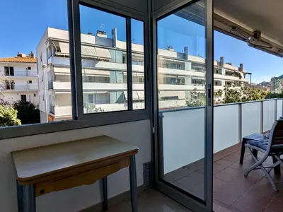 Un balcón o terraza de EVH135 Apartamento con piscina comunitaria