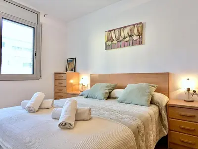 Cama o camas de una habitación en EVH135 Apartamento con piscina comunitaria