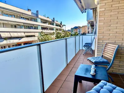 Un balcón o terraza de EVH135 Apartamento con piscina comunitaria