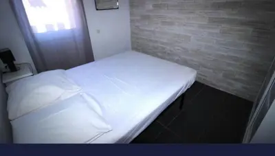Cama o camas de una habitación en Villa à Rosamar