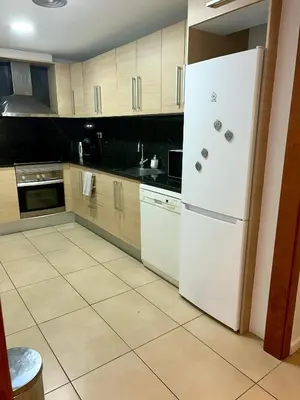 Una cocina o zona de cocina en Born to Chill Central Stay with Pool, Parking & Balcony