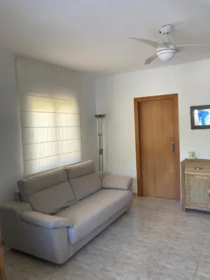 Una televisión o centro de entretenimiento en Apartamento tranquilo en Sa Conca, S'Agaro