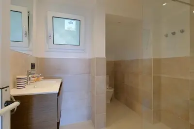 Un baño de AL-1 Llafranc 4 PAX
