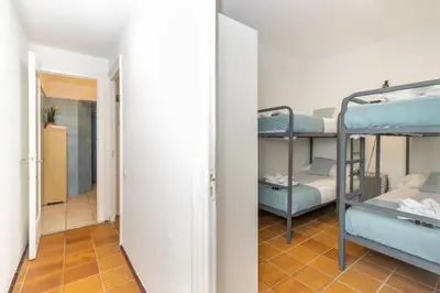 Cama o camas de una habitación en Casa de pescadores frente al mar en Calella
