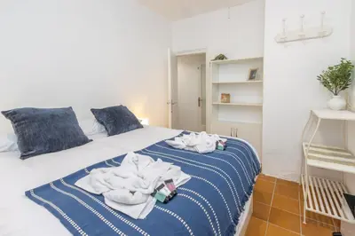 Cama o camas de una habitación en Casa de pescadores frente al mar en Calella