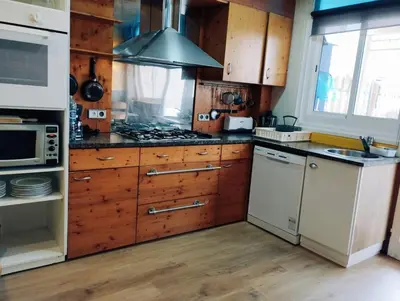 Una cocina o zona de cocina en Apart 1º & Spa and Parking in Calella, Barcelona