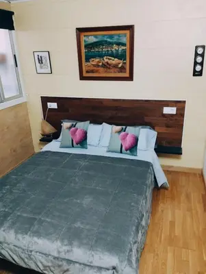 Cama o camas de una habitación en Apart 1º & Spa and Parking in Calella, Barcelona