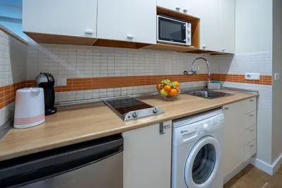 Una cocina o zona de cocina en Charming apartment in Palamós