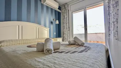 Cama o camas de una habitación en EVH126 Apartamento con gran terraza en el centro