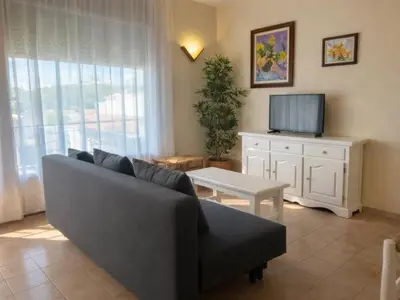 Una televisión o centro de entretenimiento en Royal E 2 º1 ª