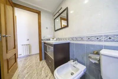 Un baño de HomeHolidaysRentals Coquette - Costa Barcelona