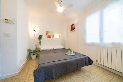 Cama o camas de una habitación en HomeHolidaysRentals Olimpia - Costa Barcelona
