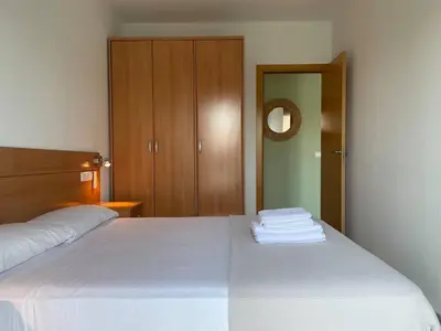 Cama o camas de una habitación en Encantador dúplex con dos terrazas cerca del mar.