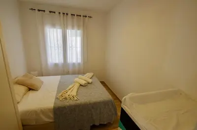 Cama o camas de una habitación en V&V Lloret-VILLA BELLO MONTE, con piscina privada y jardín