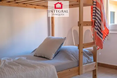 Cama o camas de una habitación en El Secret de la Fosca