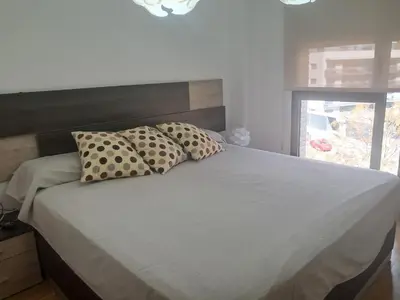 Cama o camas de una habitación en Espacioso dúplex de 3 habitaciones con piscina y parking