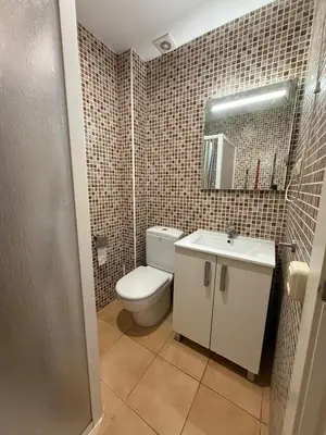 Un baño de Carrer de Unio