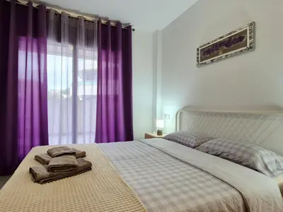 Cama o camas de una habitación en Belice B6 & Parking