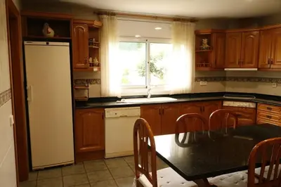Una cocina o zona de cocina en Hostalrica