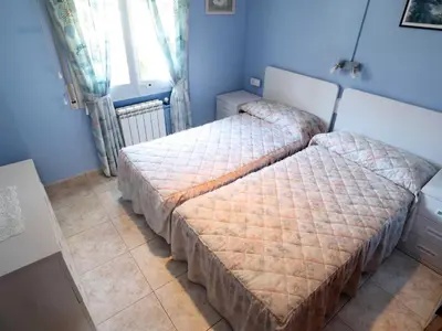 Cama o camas de una habitación en Amplio apartamento 8 pax con parking, cerca de la playa en S'Agaró - ES-298-27