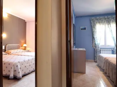 Cama o camas de una habitación en Amplio apartamento 8 pax con parking, cerca de la playa en S'Agaró - ES-298-27