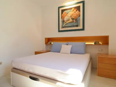 Cama o camas de una habitación en Apartamento para 6 pers con piscina y parking en S'Agaró - ES-298-21