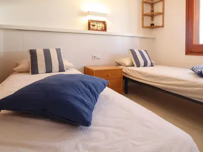 Cama o camas de una habitación en Apartamento para 6 pers con piscina y parking en S'Agaró - ES-298-21
