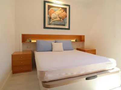 Cama o camas de una habitación en Apartamento para 6 pers con piscina y parking en S'Agaró - ES-298-21