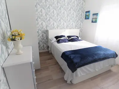 Cama o camas de una habitación en Ático con terraza cerca del mar para 4 personas en San Felíu de Guíxols - ES-298-16