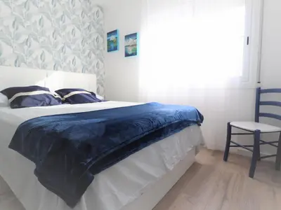 Cama o camas de una habitación en Ático con terraza cerca del mar para 4 personas en San Felíu de Guíxols - ES-298-16