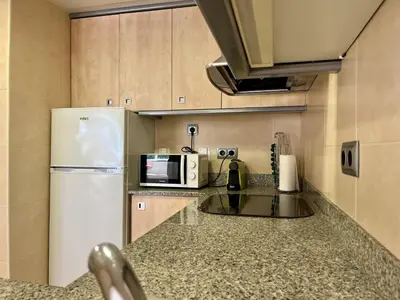 Una cocina o zona de cocina en Apartamento con vista al mar en Platja d'Aro, acceso directo a la playa - ES-298-35