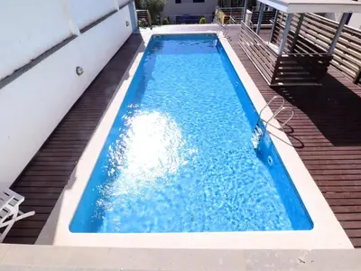 Piscina en o cerca de Apartamento en planta baja en Sant Feliu de Guíxols, para 4 pers, con terraza y piscina - ES-298-29