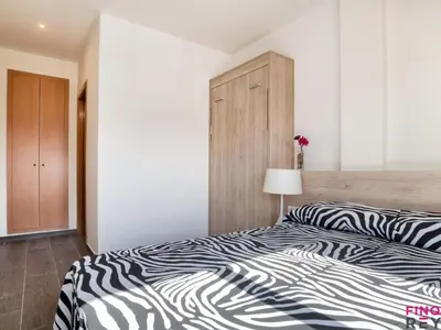 Cama o camas de una habitación en Apartamento céntrico en S'agaró con parking a 7 min de la playa - ES-298-43